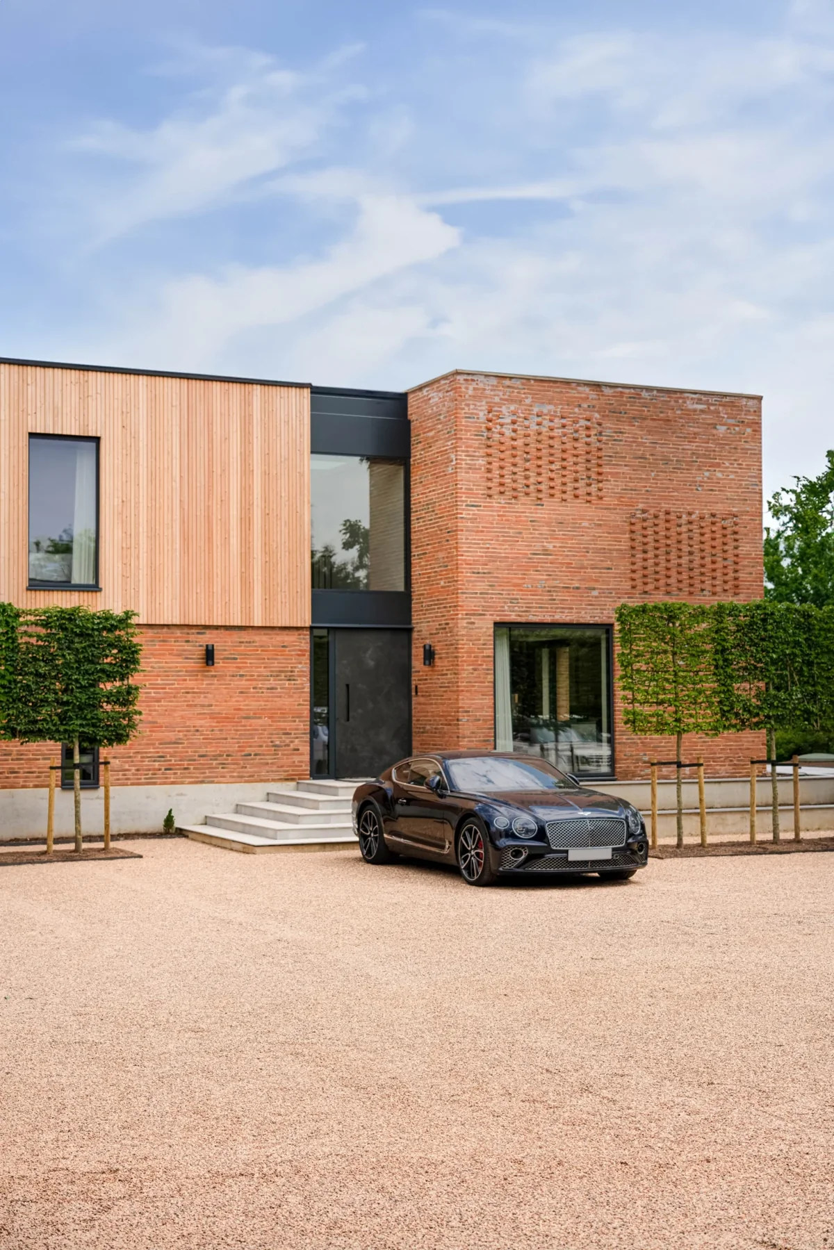 A finished residential gravel driveway using CORE DRIVE