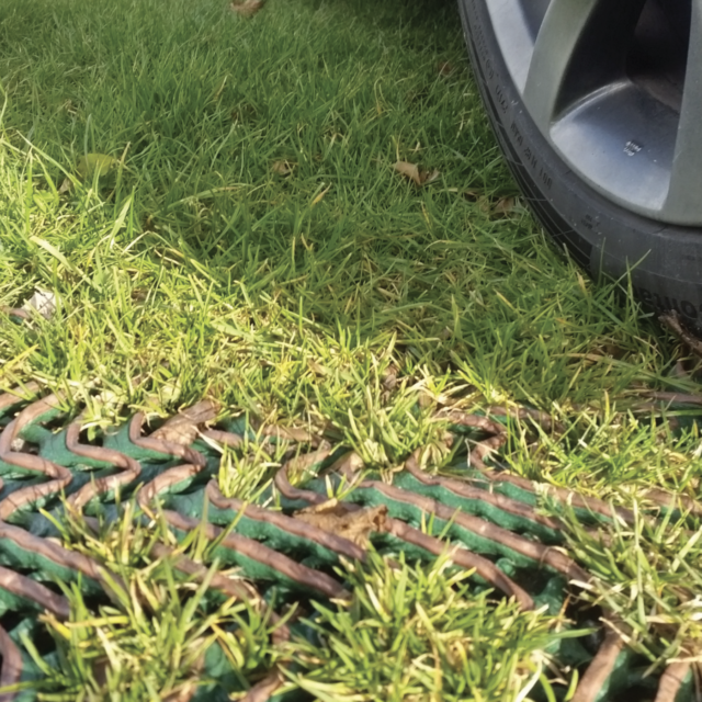 car tyre on grass mesh