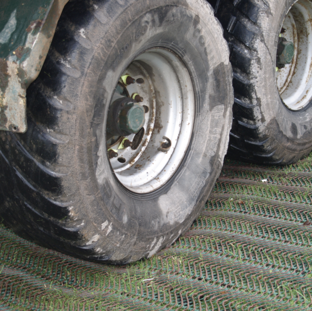 heavy goods vehicle on grass protector mesh