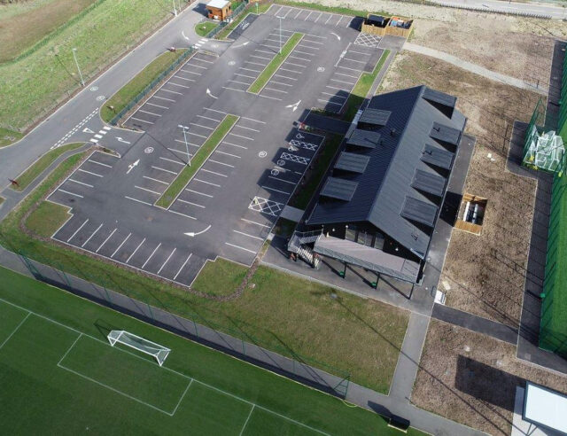 Aerial view of the academy building and parking at Bodymoor Heath.