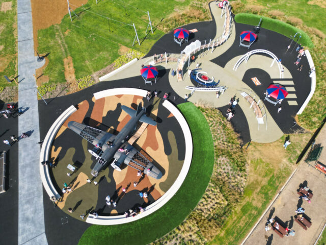 Aerial view of the Weston Play Zone and its curved paths at IWM Duxford.