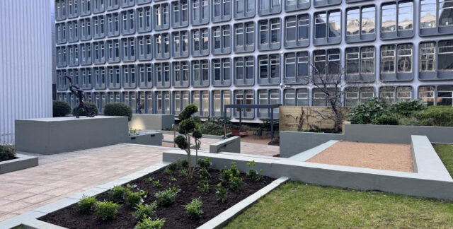 Lawns, planting and paths in the Riverside courtyard.