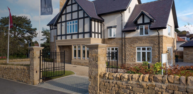 Homes and landscaped frontage at Sussex Court in Harrogate.