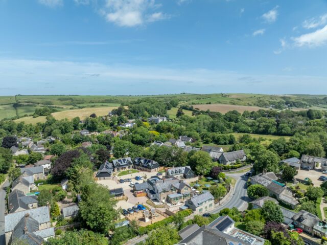 Aerial view of The Sunray and its setting near the Dorset coast.